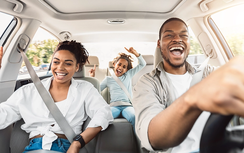 happy family in car
